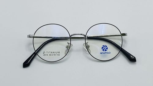 نظاره طبية دائرية من التيتانيوم اللون فضي أسود رقم...