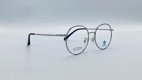 نظاره طبية دائرية من التيتانيوم اللون فضي أسود رقم...