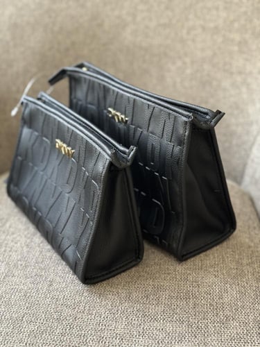 طقم شنط ميك أب أو عطور او باوتش dkny