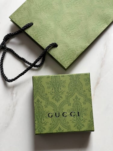 تعليقة Gucci
