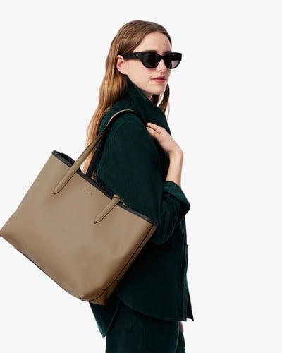 شنطة Lacost مع باوتش دبل فيس