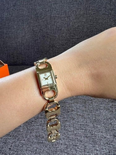 ساعة tory burch