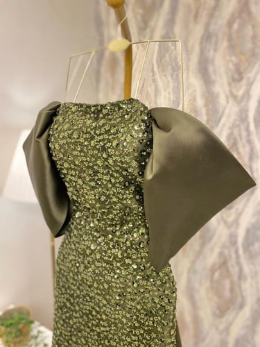 فستان زيتي سهره