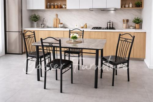 طاولة طعام سراميك + 4 كراسي قماش جلد بعدة ألوان.