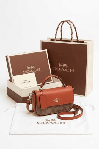 شنطة كوتش ميني سوداء مونوغرام أصلية مع كامل ملحقات...