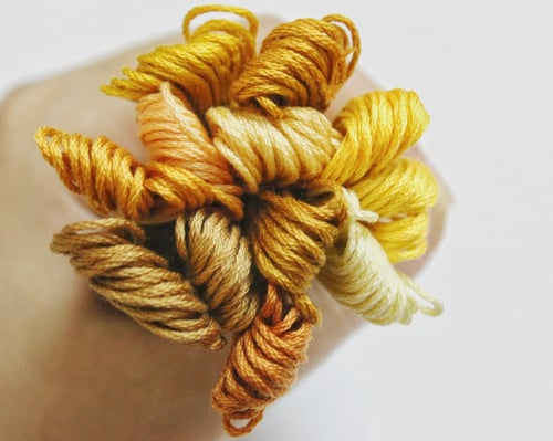 خيوط تطريز درجات دوار الشمس