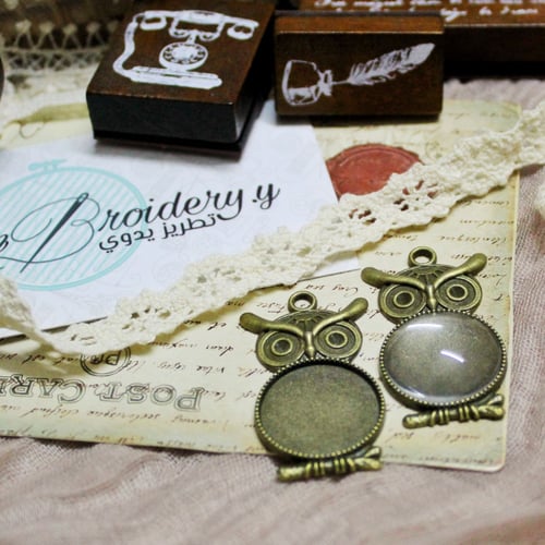 قلائد برونزي شكل بومه