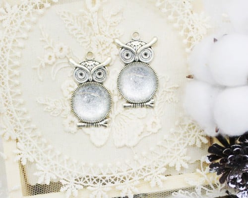 قلائد فضية شكل بومه