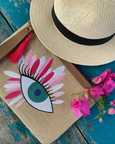 شنطة كلتش عين