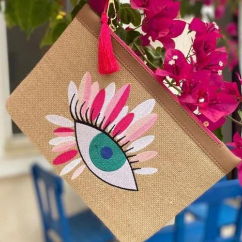 شنطة كلتش عين