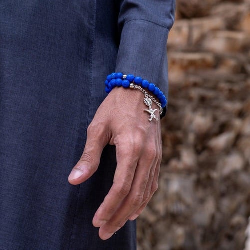 أسورة + سبحة زرقاء على شكل سيفين ونخلة