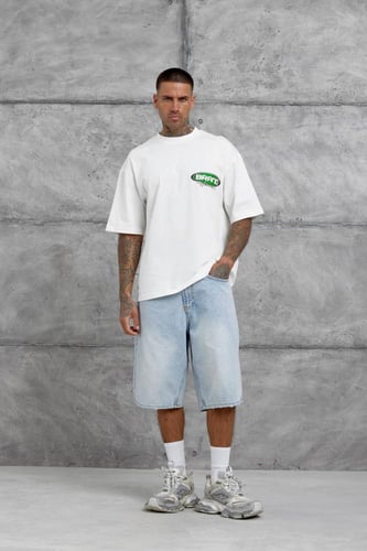 تيشيرت أبيض اوفرسايز أنيق بخامة ناعمة