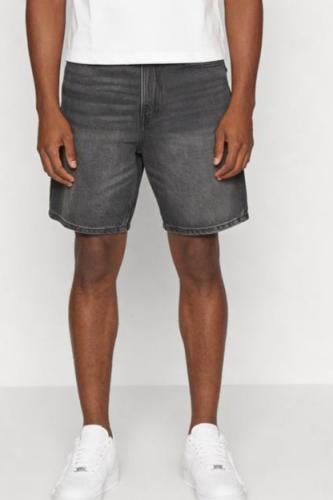 شورت جينز قصة BUGGY واسع لون اسود