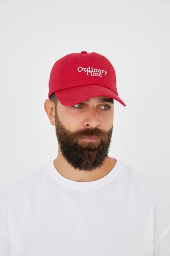 كاب عنابي بكتابة ordinary time