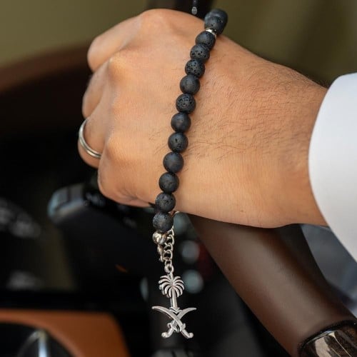 أسورة + سبحة سوداء على شكل سيفين ونخلة