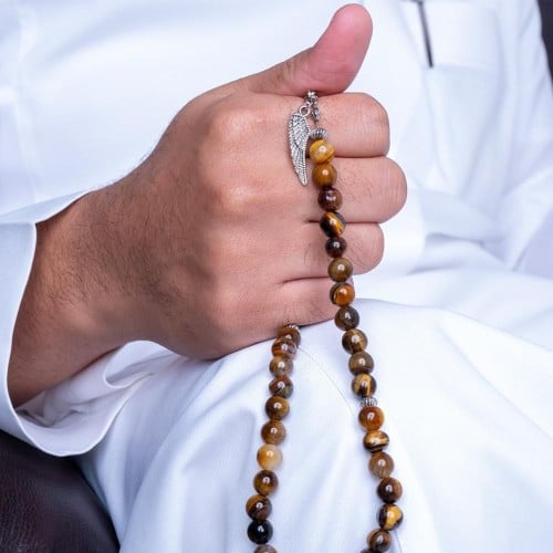 أسورة + سبحة بلون البني على شكل جناح