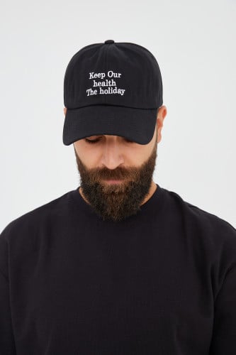 كاب أسود بكتابة ordinary time