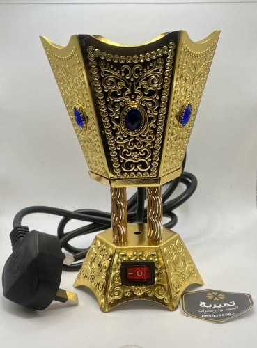 مبخرة كهبائية ذهبية