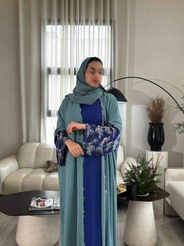 فستان تحت العباية