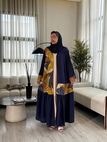 عباية قصة كلوش نوع القماش كريب مع طبقة رفلز