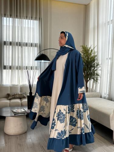 فستان أبيض تحت العباية