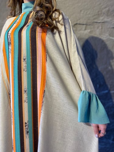 جلابية بيتي لنن واسعة بأطراف كشكش