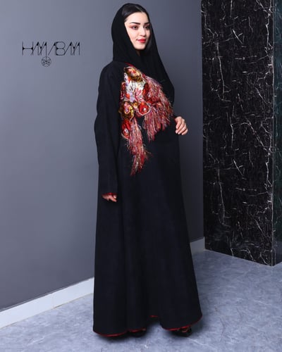 عباية كلوش شامواه مزخرفة مع كينار ملون على الصدر و...