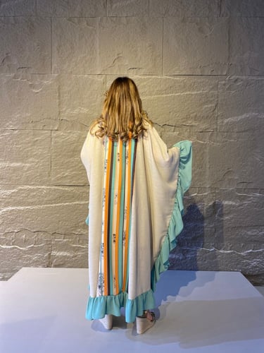 جلابية بيتي لنن واسعة بأطراف كشكش