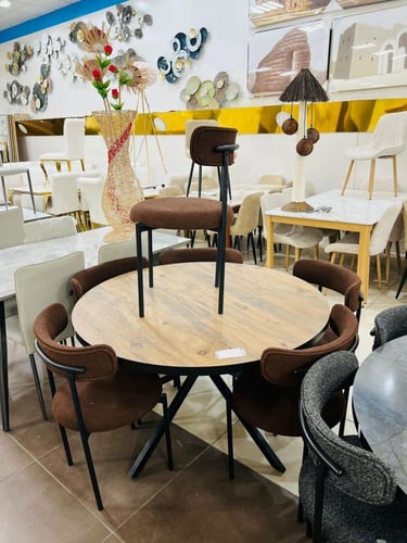 طاولة طعام دائرية خشبية مع 6 كراسي بتصميم عصري