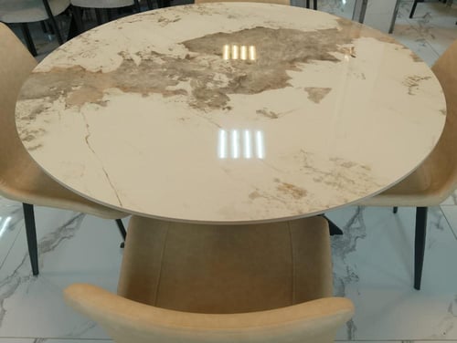 طاوله طعام سيراميك دائريه 4 كرسي