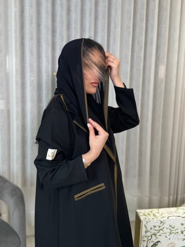 بليزر كريب الاناقة بدون تحديد الأكماماللون كموني