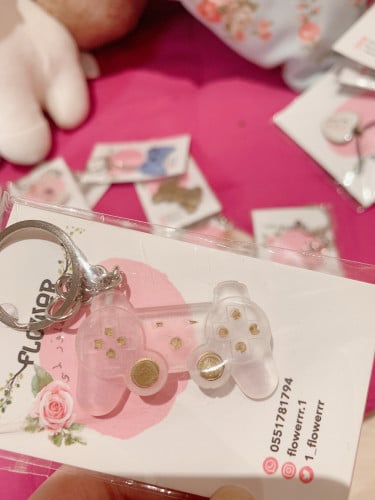 ميدالية يد سوني ذهبي وشفاف