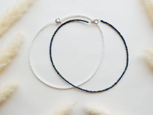 مجموعة من 4 سلسال وخواتم