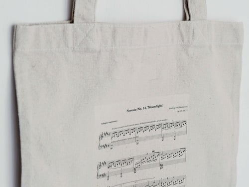توت باق Tote bag من القطن بتصميم ورقة موسيقية ضوء...