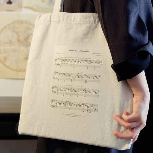 توت باق Tote bag من القطن بتصميم ورقة موسيقية ضوء...