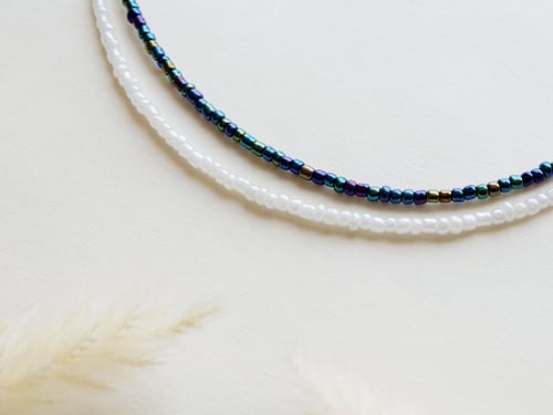 مجموعة من 4 سلسال وخواتم