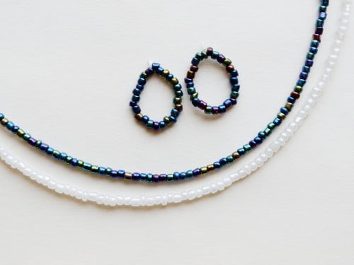 مجموعة من 4 سلسال وخواتم