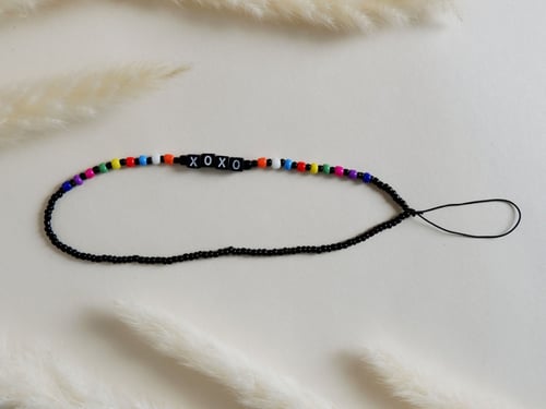 تعليقة زينة للجوال XOXO