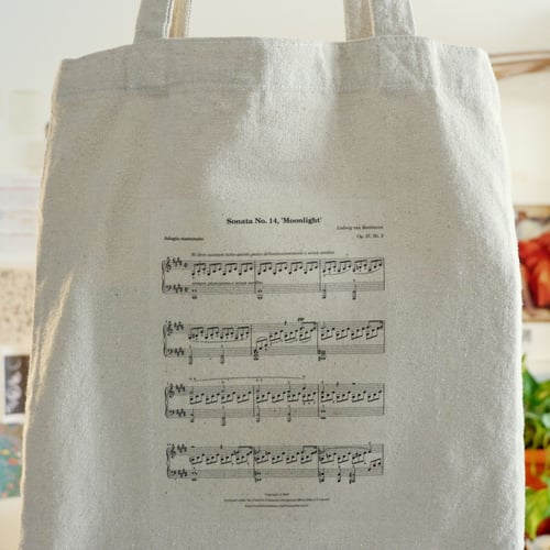 توت باق Tote bag من القطن بتصميم ورقة موسيقية ضوء...