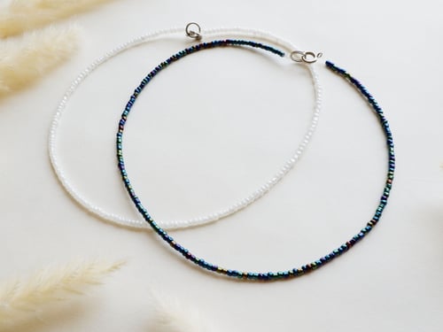 مجموعة من 4 سلسال وخواتم