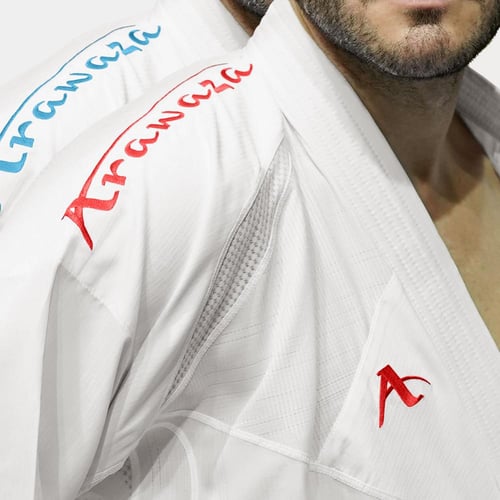 بدله قتال وجهين قابل للعكس تطريز احمر وازرق Arawaz...