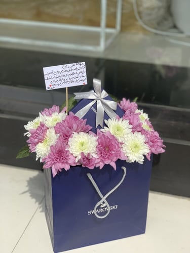 تنسيق مجموعه هدايا على كيس سواروفيسكي