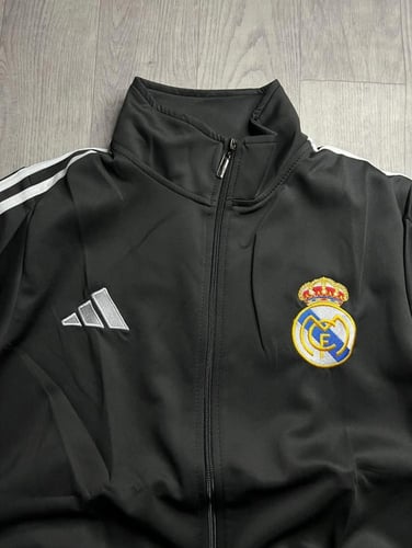 جاكيت ريال مدريد الاسود الشتوي 2026