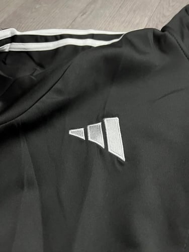 جاكيت ريال مدريد الاسود الشتوي 2026