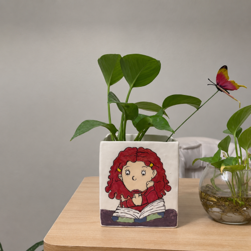 اصيص نبات (رسمة من اختيارك)