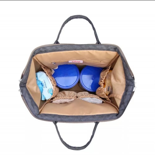 شنطة لاحتياجات الاطفال والمواليد مع سخان الرضعة وع...