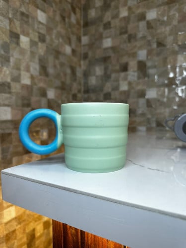 كوب سيراميك اخضر بمسكه سماوي