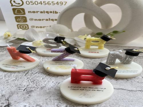 شموع الأحرف المعطرة