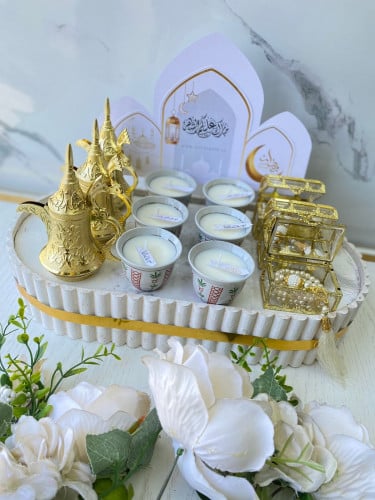 توزيعات دلة و شموع معطرة