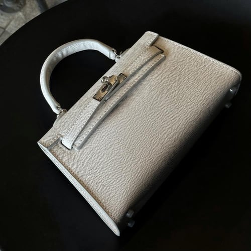 كيلي ابيض قفل فضي